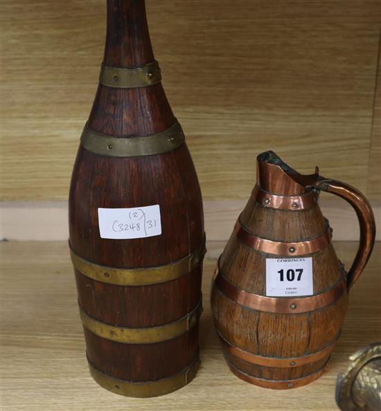 A French staved oak bottle marked Grand Lafitte and a staved oak jug bottle 40cm